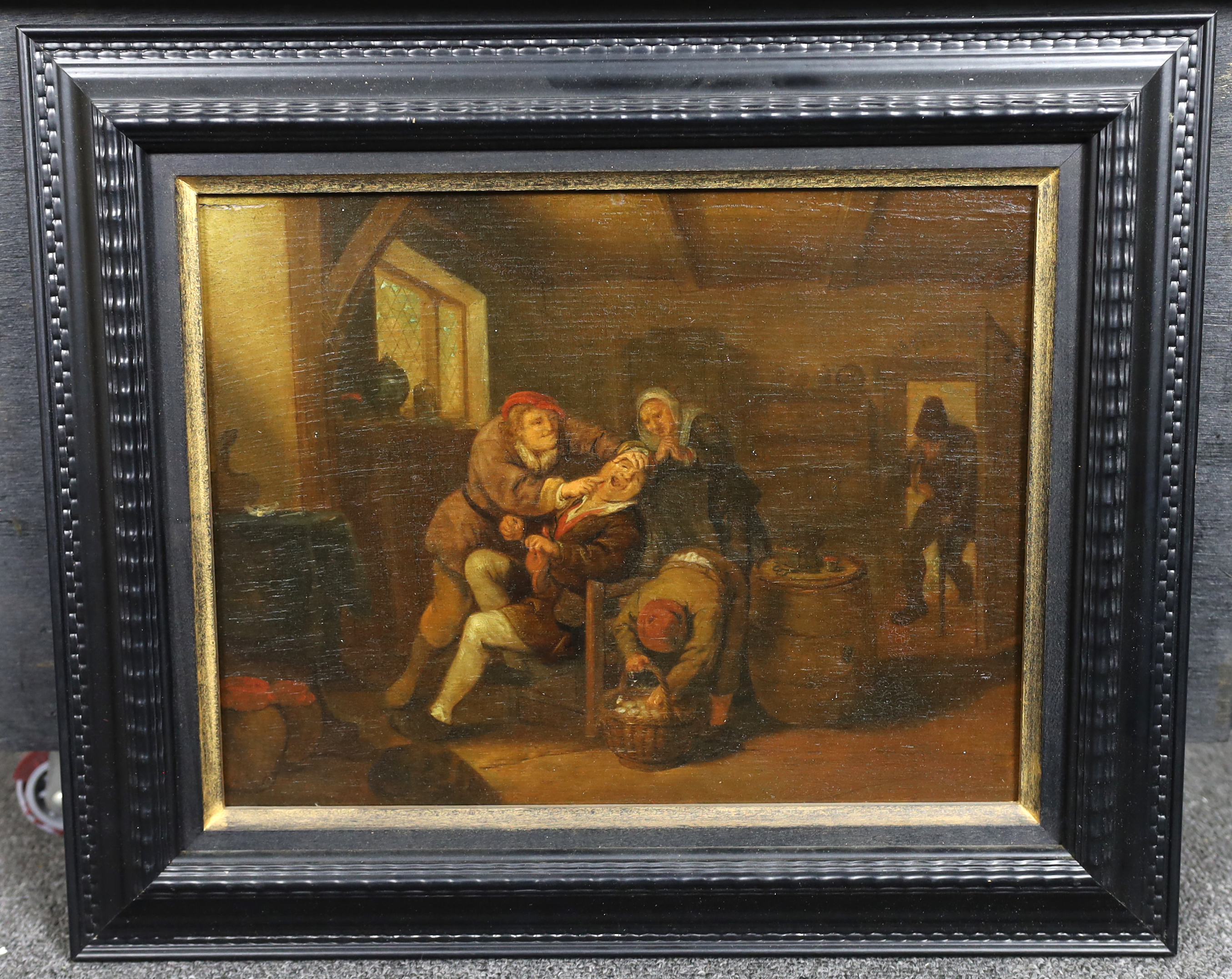 Manner of Jan Miense Molenaer (Dutch, 1610-1668), 'The Dentist', oil on panel, 24 x 31cm, Please note this lot attracts an additional import tax of 5% on the hammer price